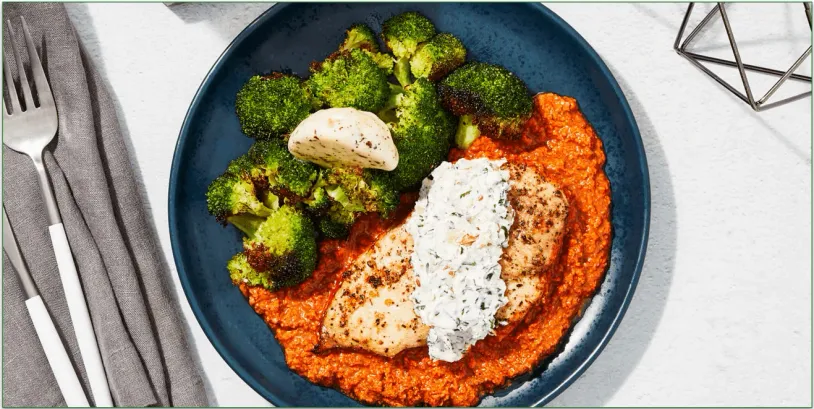 Stock photo of Factor's Goat Cheese & Romesco Baked Chicken with Lemon Basil Broccoli