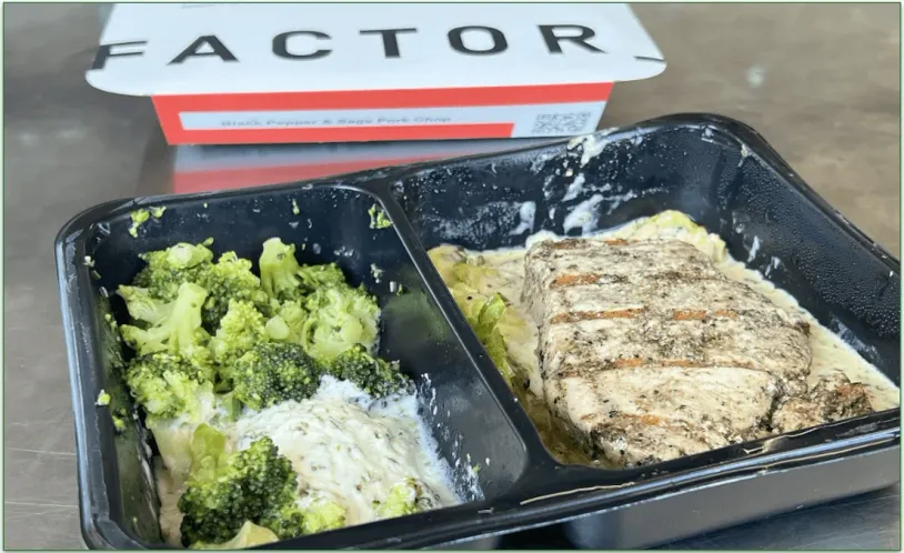 Photo of Factor's Black Pepper & Sage Pork Chop dish in a microwaveable tray