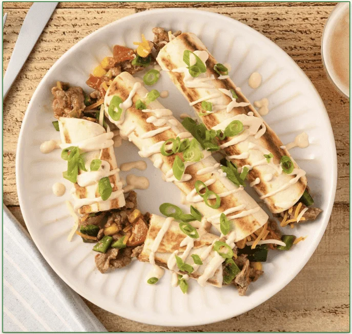 Texas-Style Steak Flautas with Chipotle Crema and Green Onions by Home Chef