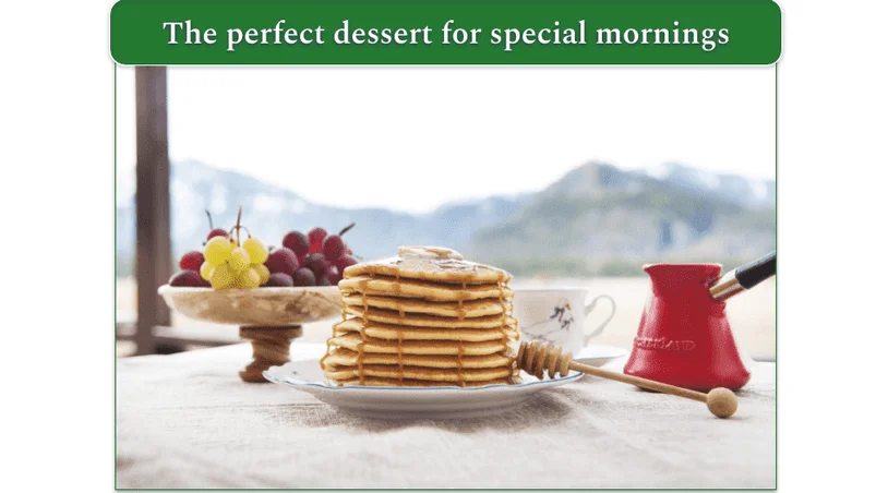 Cinnamon Roll Pancakes stacked on a plate