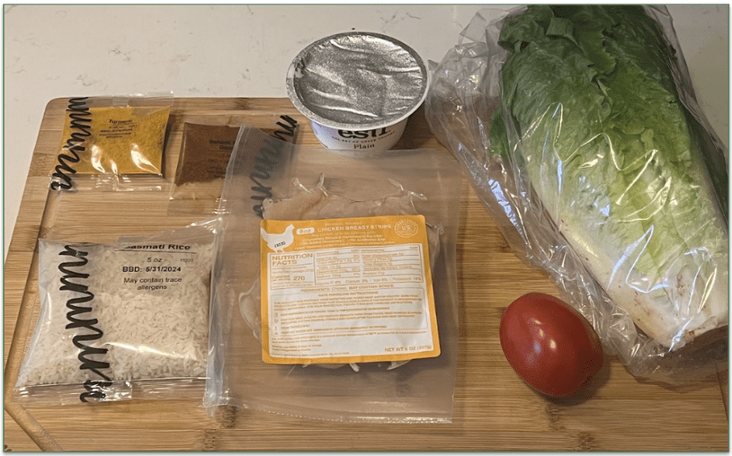 Photo of the 7 ingredients set out on a chopping board for a Dinnerly recipe
