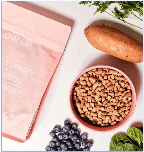 Image features 1 bag and 1 bowl of Maxbone's Turkey Meal