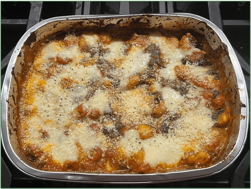 Reviewers own Cheesy Gnocchi in a foil dish