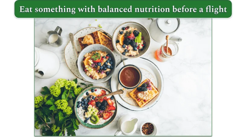 a picture of various foods including berries, fruit, honey, waffles, oatmeal, and eggs