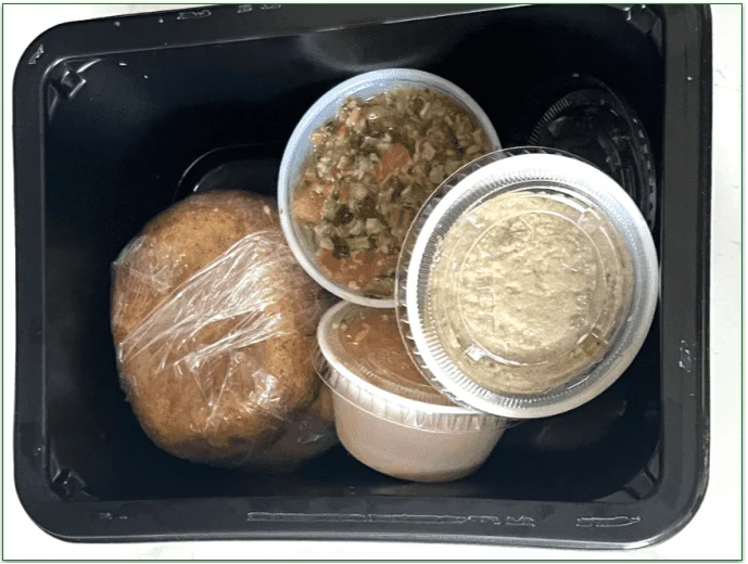 Inside the meal tray with the meal components wrapped separately and securely