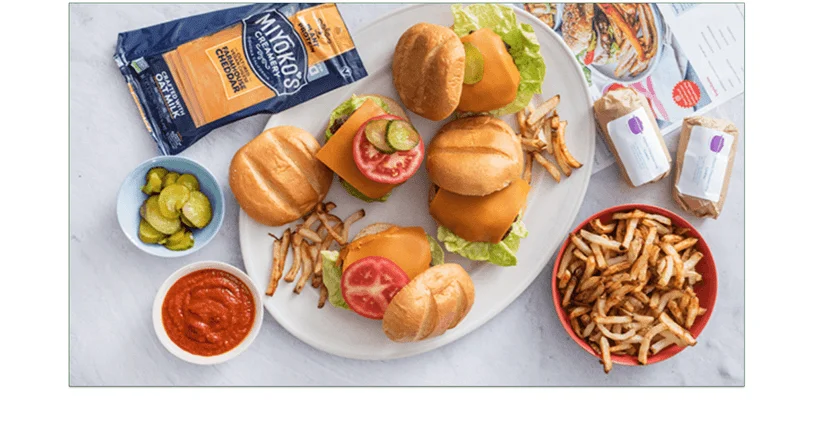Photo of the vegan burgers and fries from One Potato as one example of the family-friendly meals