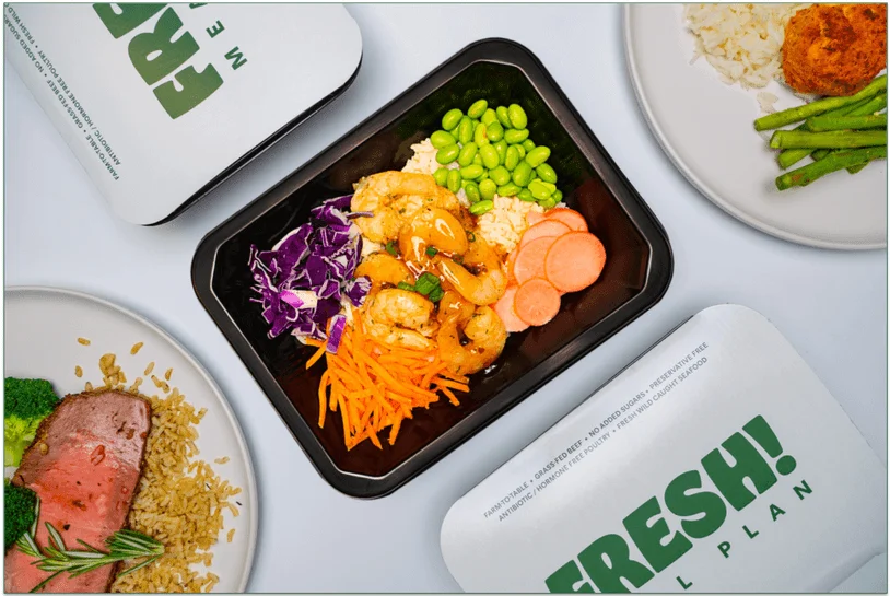 Fresh Meal Plan meals on plates and in a microwaveable tray