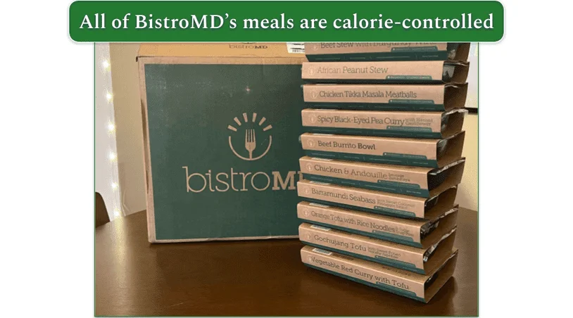 Stack of BistroMD meals next to a box
