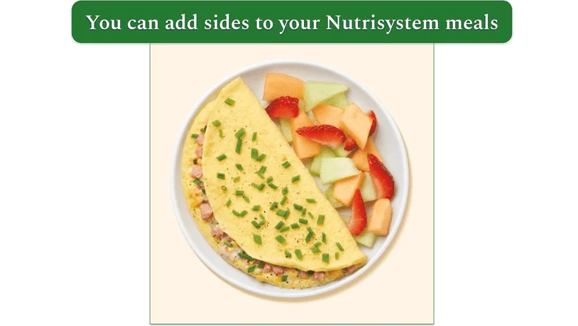 Nutrisystem's Turkey Ham and Cheese Omelet pictured with chopped fresh fruit on the side