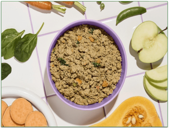 Ollie's fresh pork meal surrounded by ingredients