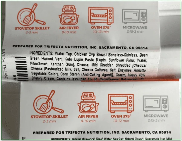 Photo of 2 packaged meals from Trifecta showing the heating instructions