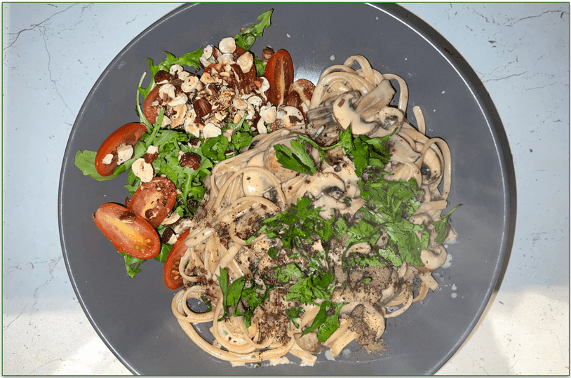 Mushroom truffle linguine with a toasted hazelnut and rocket salad prepared by our reviewer