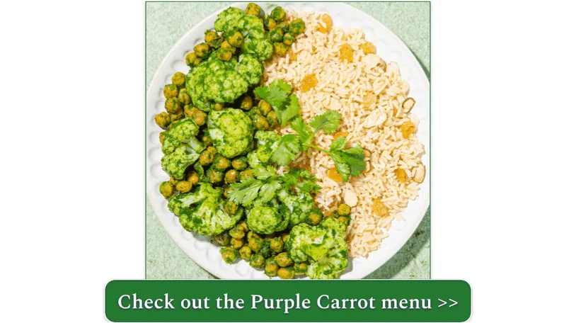 A picture of sauteed cauliflower and chickpeas over a bed of almond and sultana rice pilaf