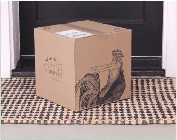 A Spoonful of Comfort delivery box on a doorstep