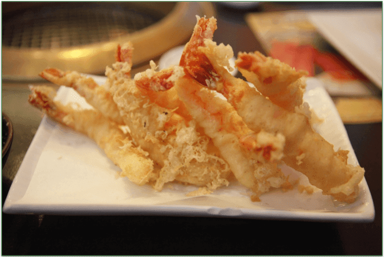 Fried shrimp tempura served on a plate