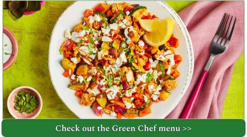 A colorful plate of turkey and vegetables