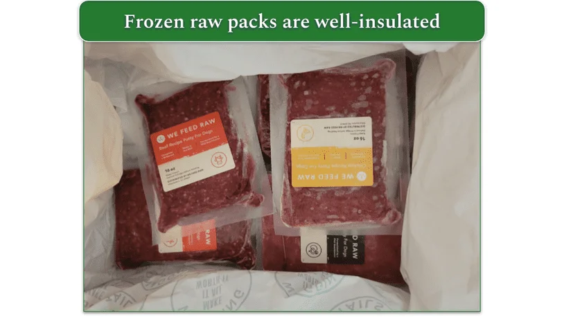 Open We Feed Raw delivery box with frozen packs
