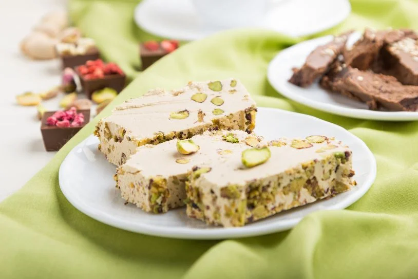 Halva with pistachios on a plate