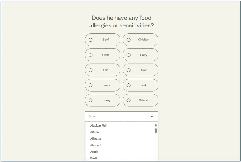 Screenshot of the allergen section of Ollie's quiz with a dropdown list of allergens in alphabetical order including alligator, apple, and more