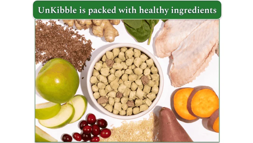 Bowl of Spot & Tango's UnKibble surrounded with natural ingredients