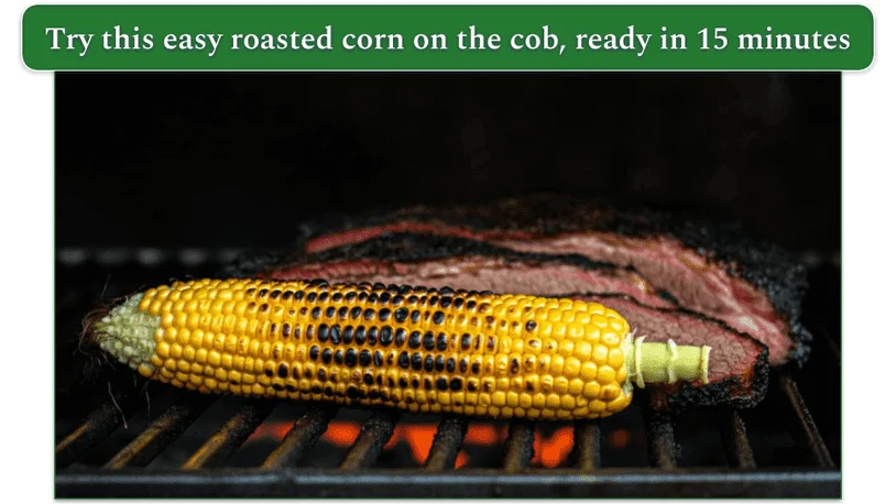 Corn on the cob on a grill beside some brisket meat.
