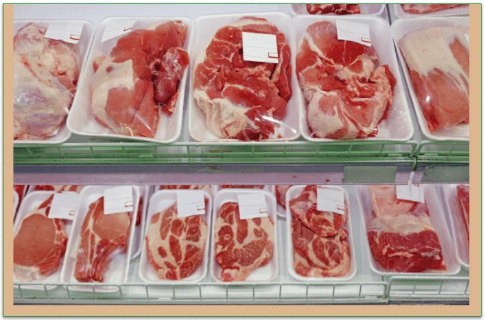 Packs of beef in a grocery fridge