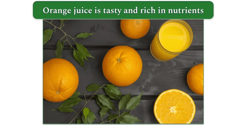 A glass of orange juice and several fresh oranges on a table