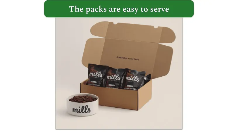 Picture of an open cardboard box containing Mills Daily Packs next to a dog food bowl