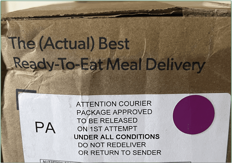 Delivery box with a label advising package to be left at destination under all conditions