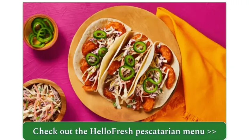 Three Baja Shrimp tacos with slaw and sliced jalapeños