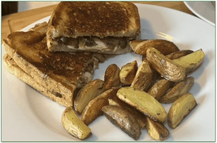The Melty Mozz & Mushroom Panini dish served on a plate