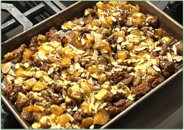 Photo of a tray containing the cooked Pork Chorizo, Potato & Fig Bake dish