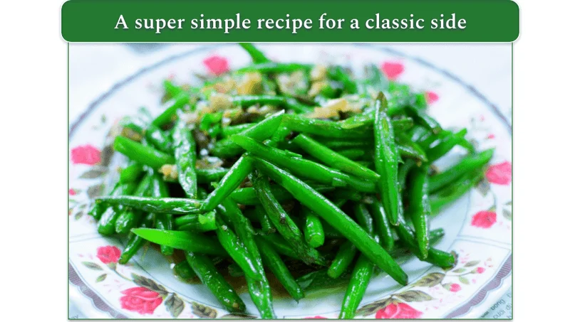 A plate of sautéed green beans in garlic