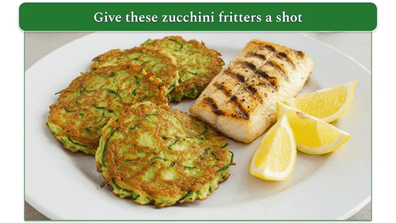 Some zucchini fritters on a pate beside a grilled piece of fish.