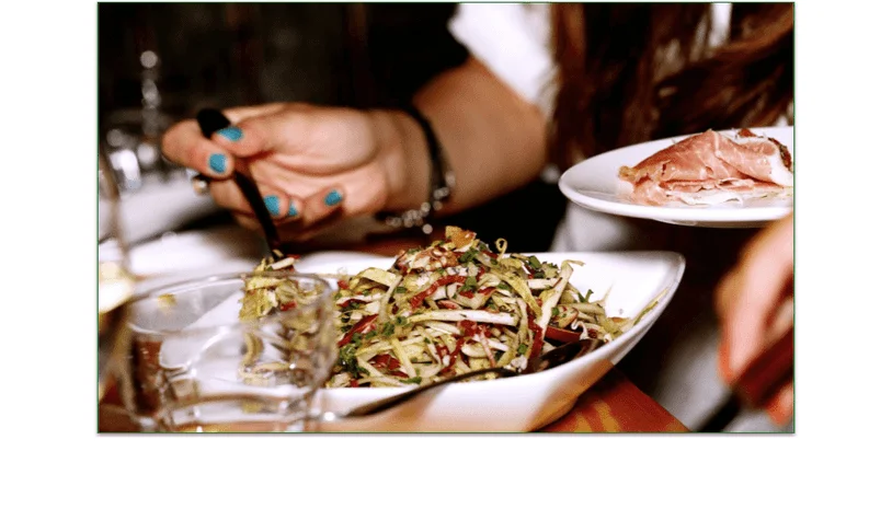 Person eating in a restaurant