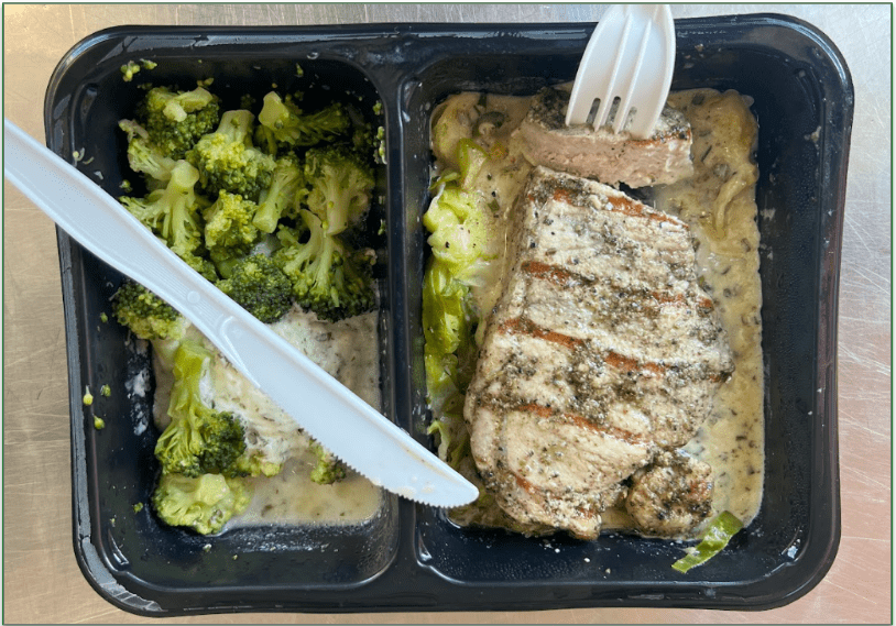 Factor Black Pepper Pork Chop with Broccoli in the microwaveable container from Factor