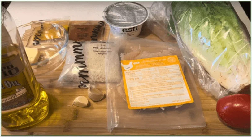 Image of packaged ingredients set out on a chopping board