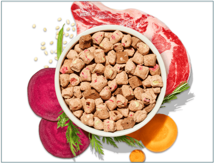 Spot & Tango’s beef unkibble in a bowl surrounded by ingredients