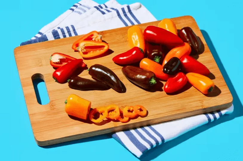 Mini sweet peppers on a board from HelloFresh