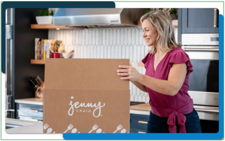 A woman opening a Jenny Craig delivery box