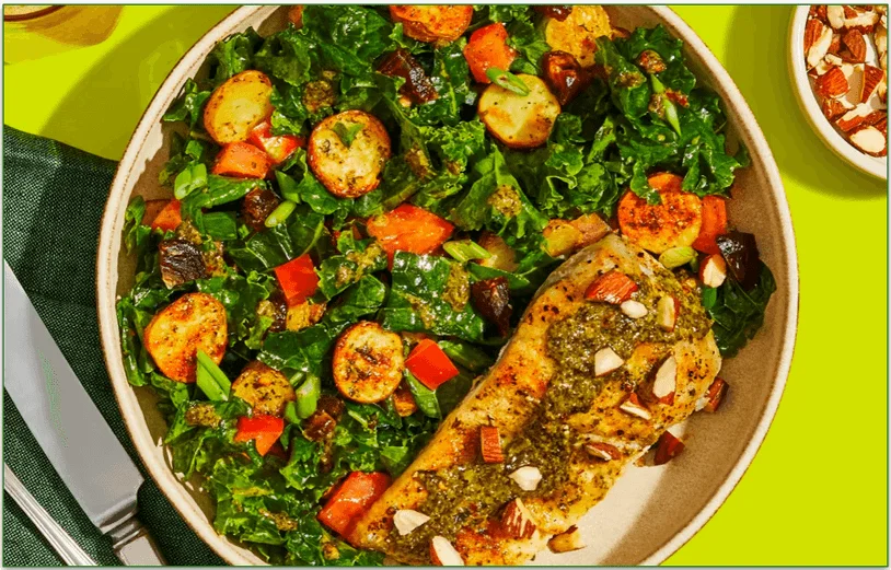 Green Chef's Herbed Barramundi with Schug Sauce and Kale Salad with Roasted Fingerlings, Tomato, and Almonds