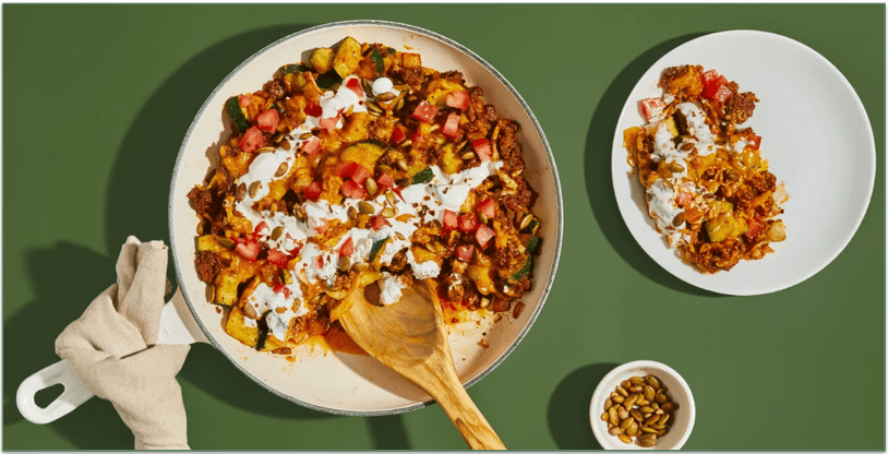 Green Chef's Taco-Spiced Beef & Squash Skillet with Tomato, Toasted Pepitas, Sharp Cheddar, and Crema