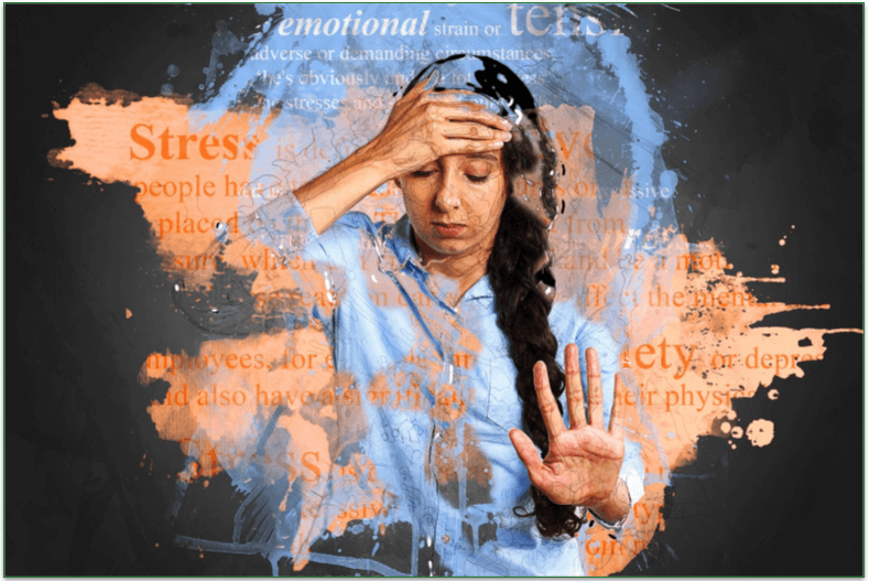 Woman looking stressed with text defining stress in the background
