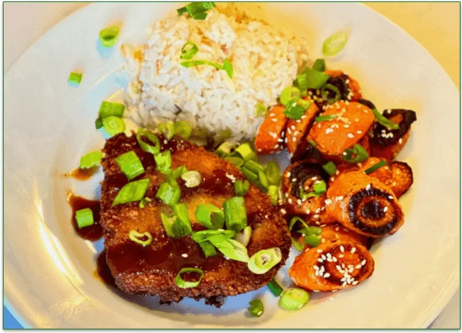 A plate of Pork Katsu with rice and carrots from HelloFresh