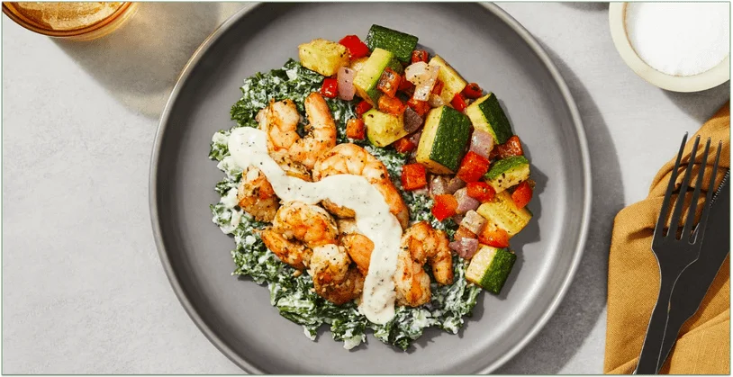 Factor's Tuscan Shrimp with Creamy Kale & Zucchini-Pepper-Onion Medley