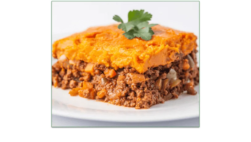 A slice of Elk Shepherd's Pie topped with squash