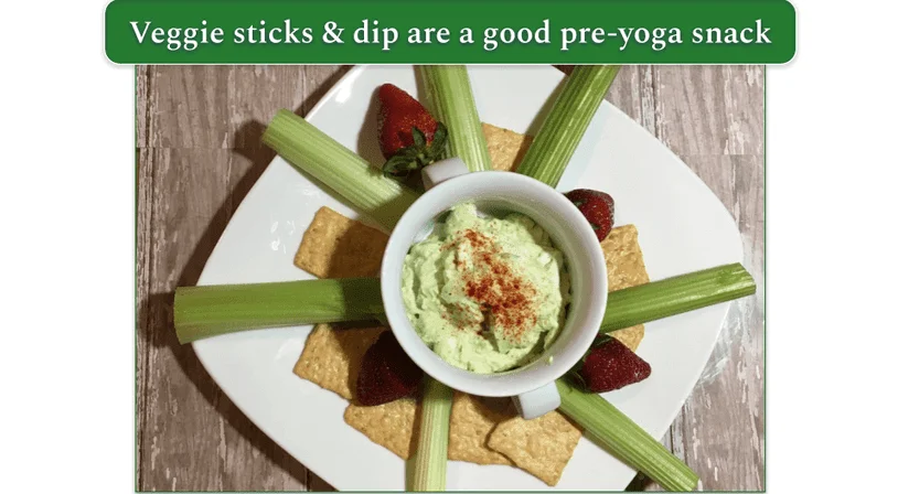 Plate of celery sticks, crackers, and dip