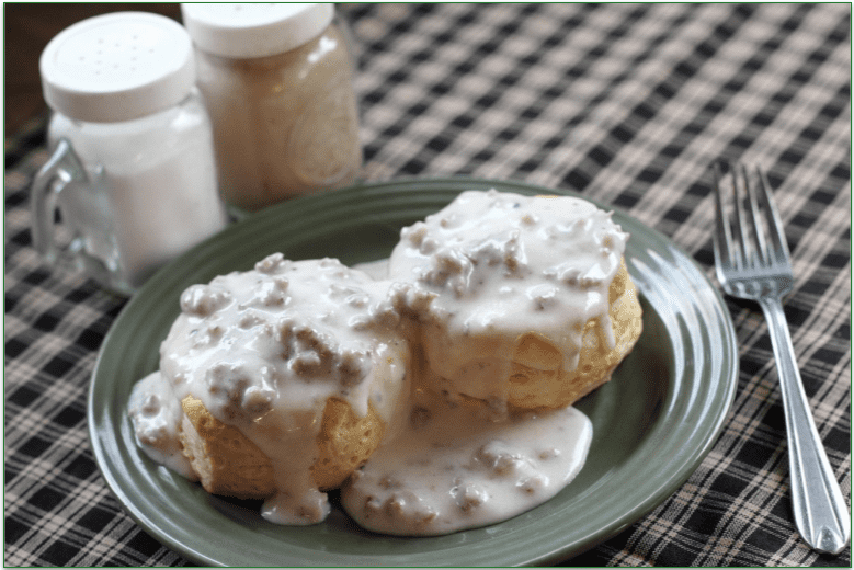 Biscuits and mushroom gravy served on a plate