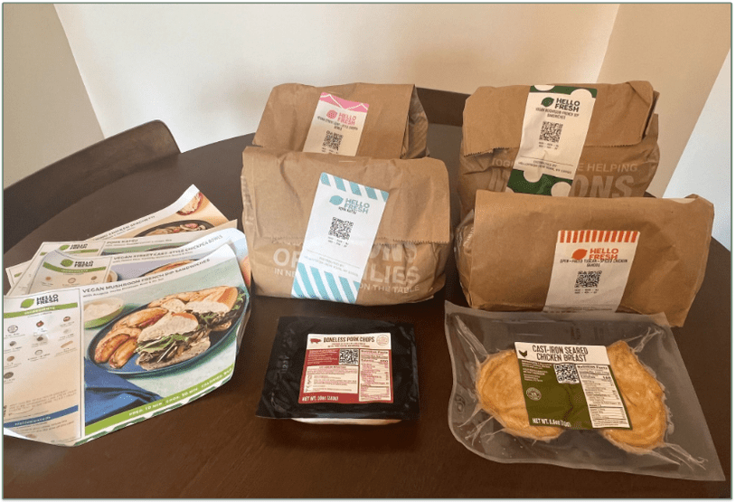 Image of 4 HelloFresh recipe bags on a table