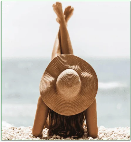 Image of a woman with healthy skin basking in the sun